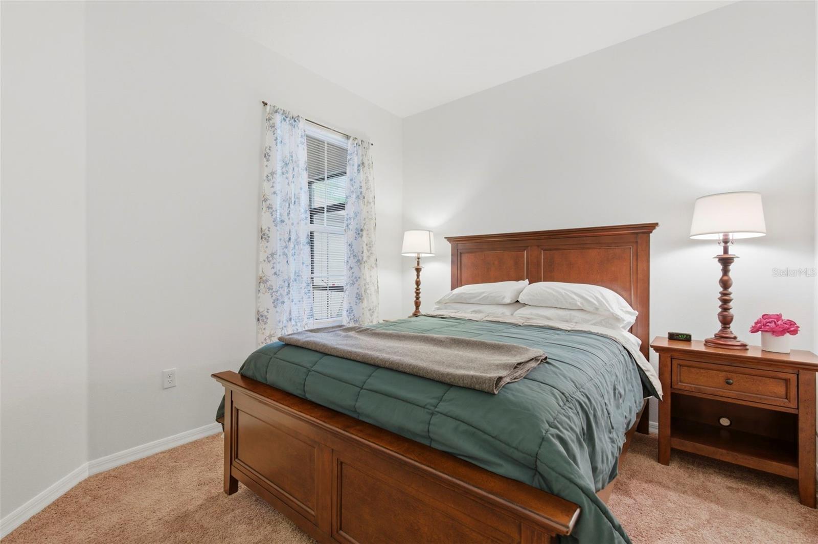 Bedroom 2, located on the front side of home.