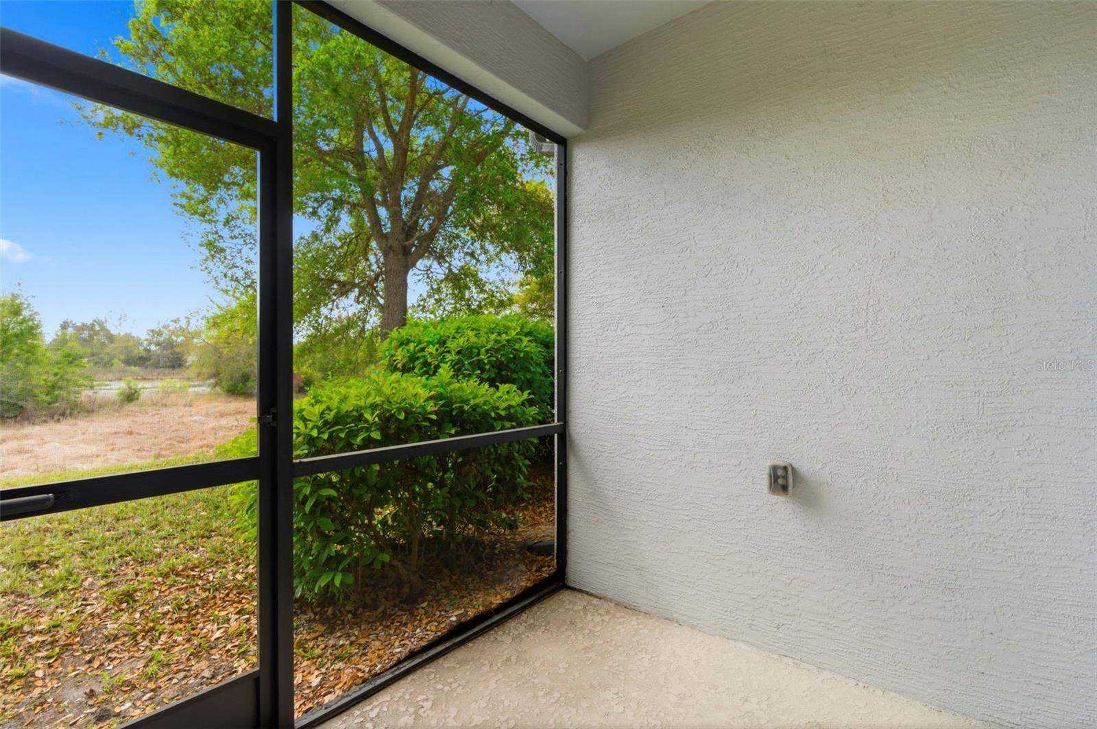 Rear screened-in porch