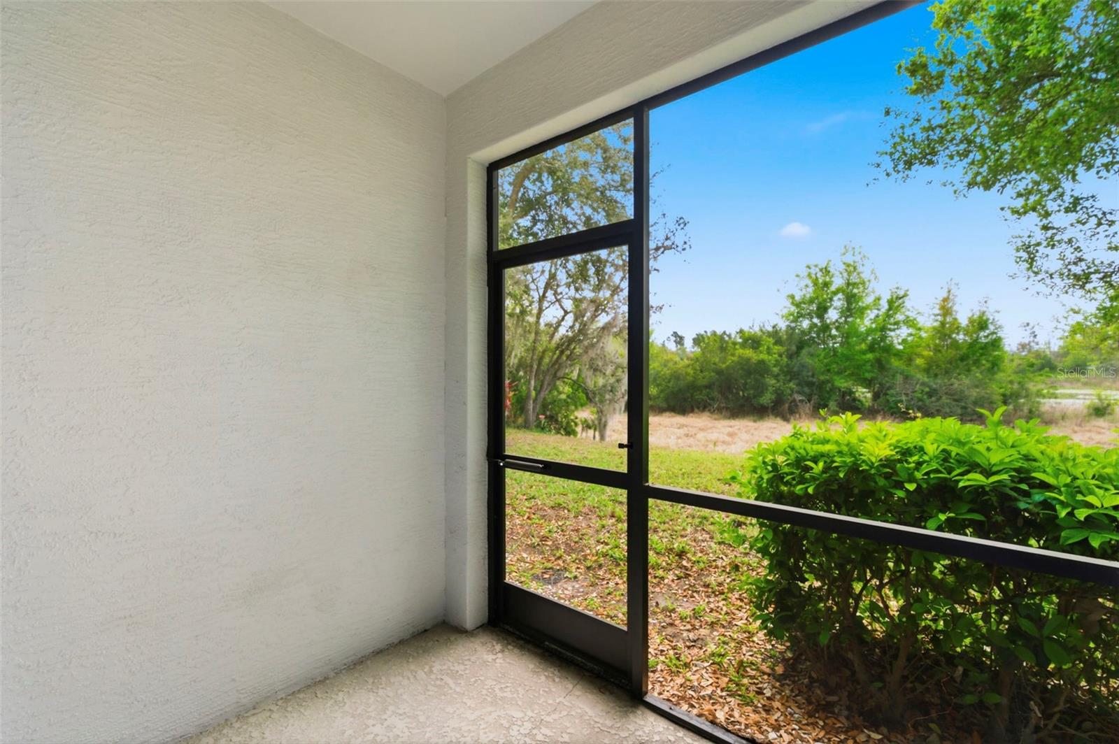 Rear screened-in porch
