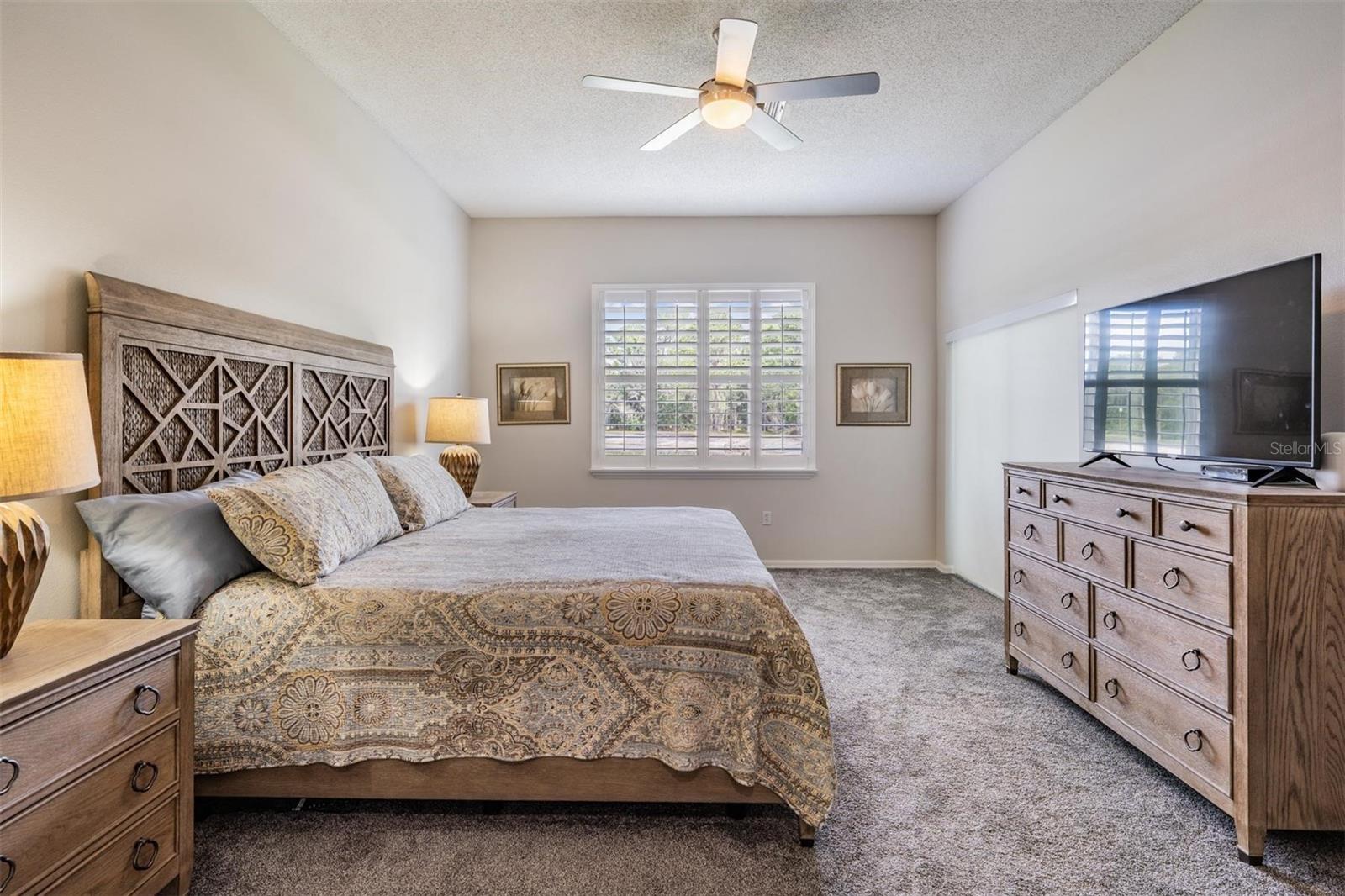 Plantation shutters and pond views
