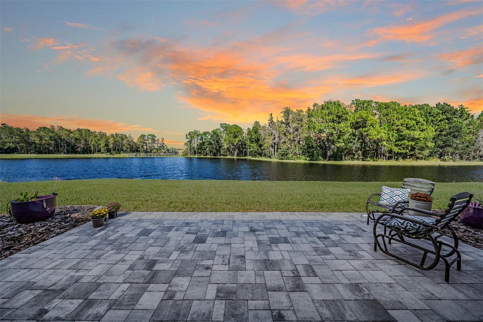 Twilight pond view from pavered patio