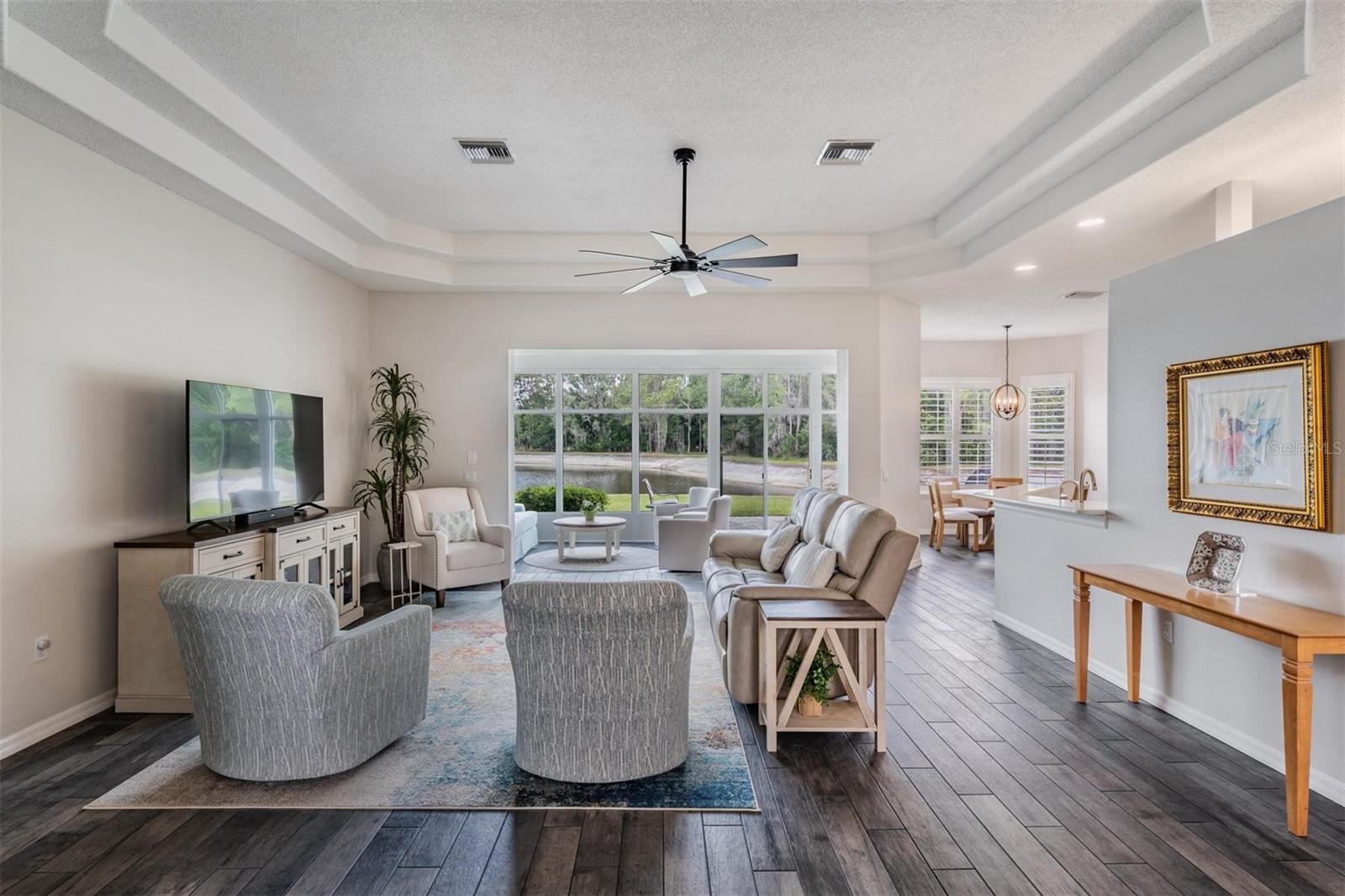 Designer touches such as a tray ceiling in great room