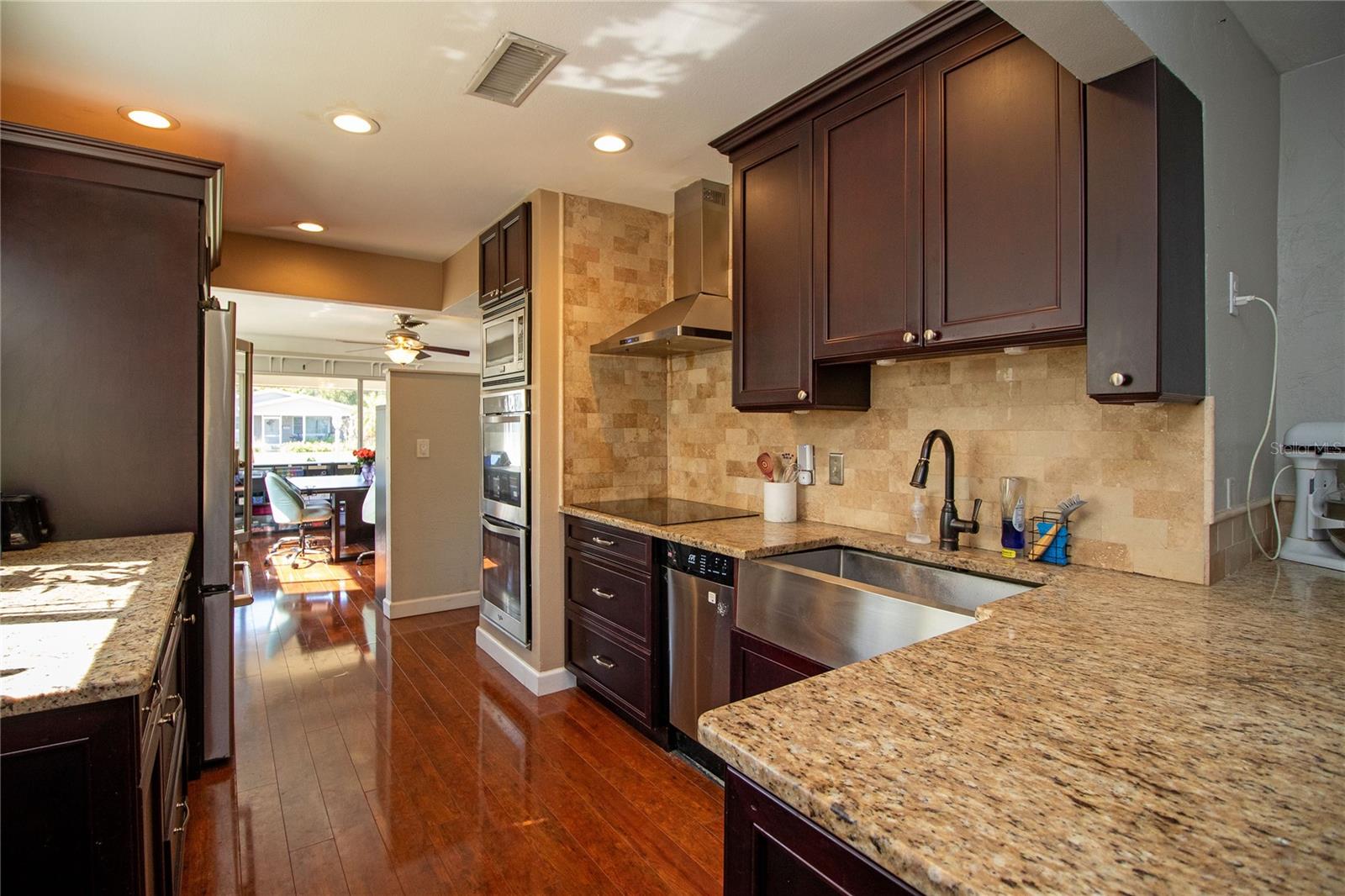 Updated kitchen with custom cabinets.