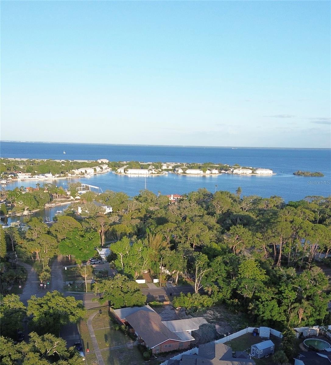 Aerial view of surrounding area and nearby waterfront