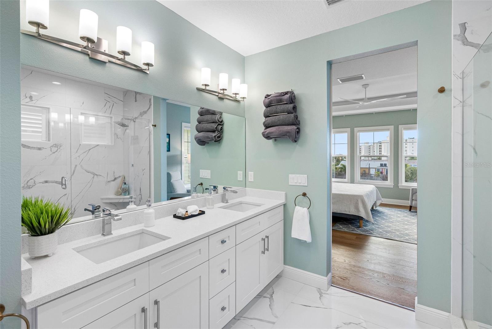 Primary Bathroom with Dual Sinks and stone counters