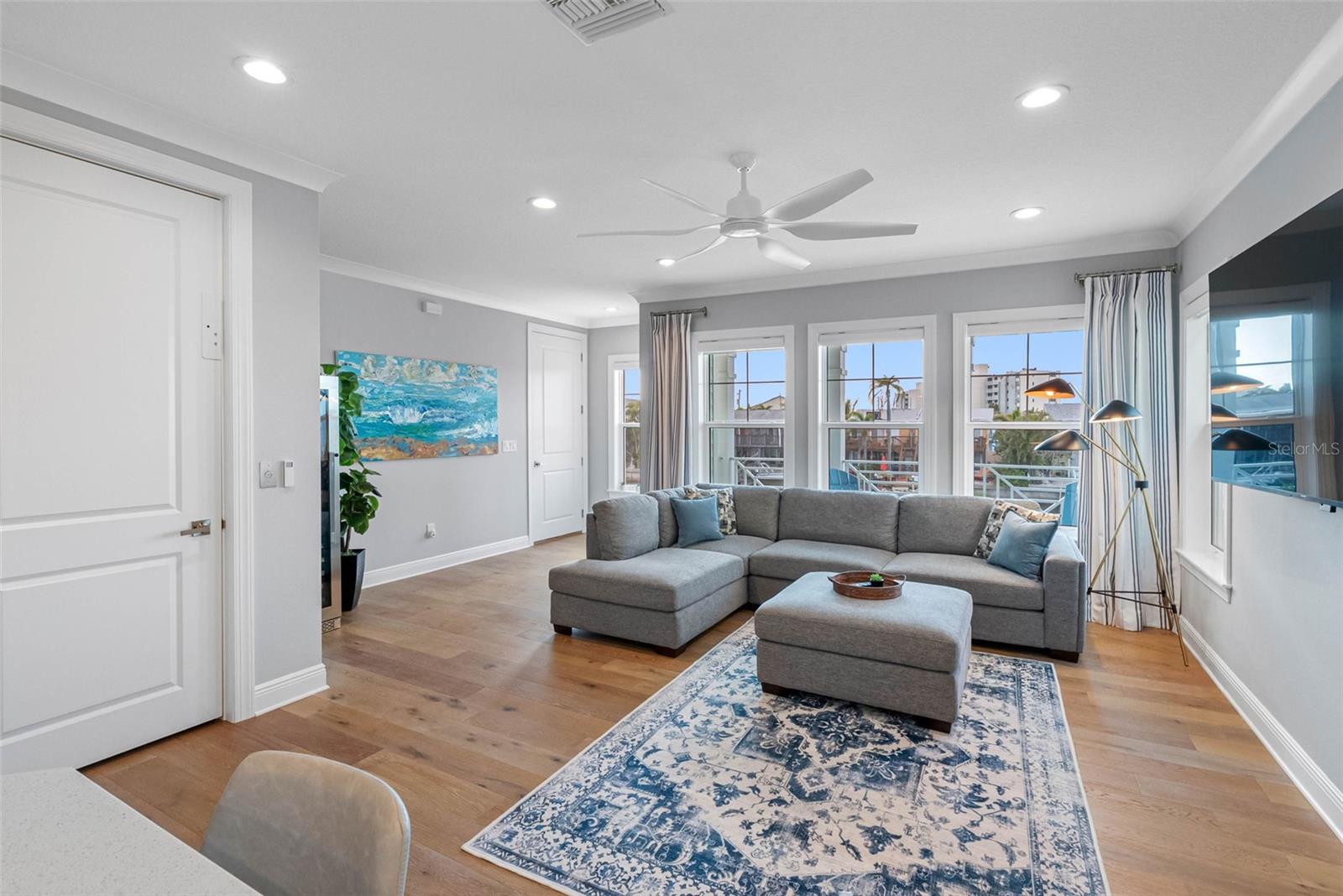 Living Room overlooks water and Balcony