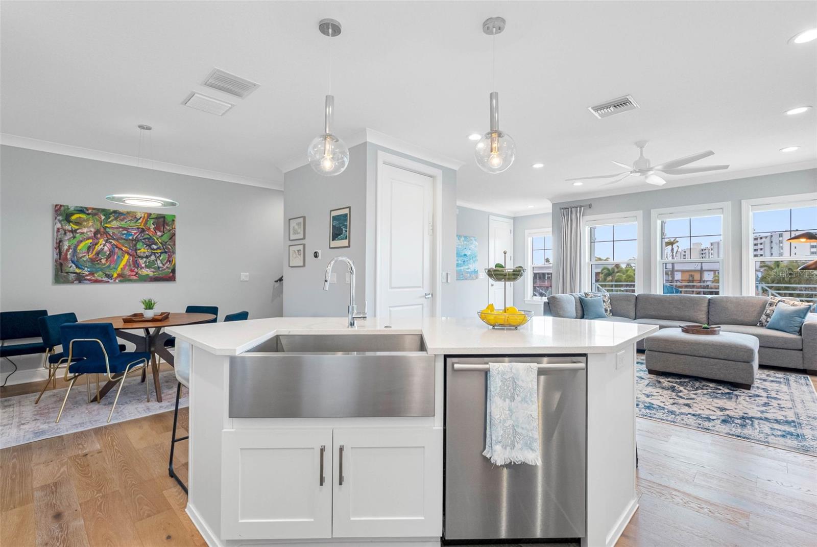 Stainless Farmhouse Sink and Dishwasher in the island