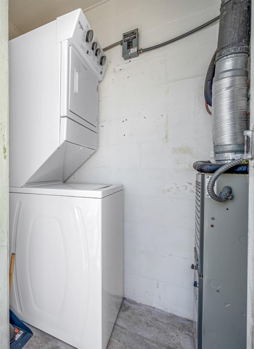 In-unit stacked washer/dryer