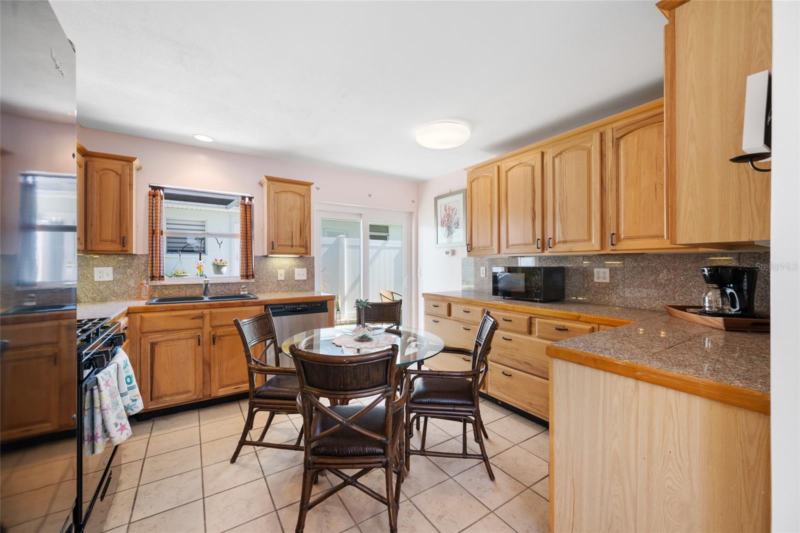 Kitchen with ample counter space and cabinet storage
