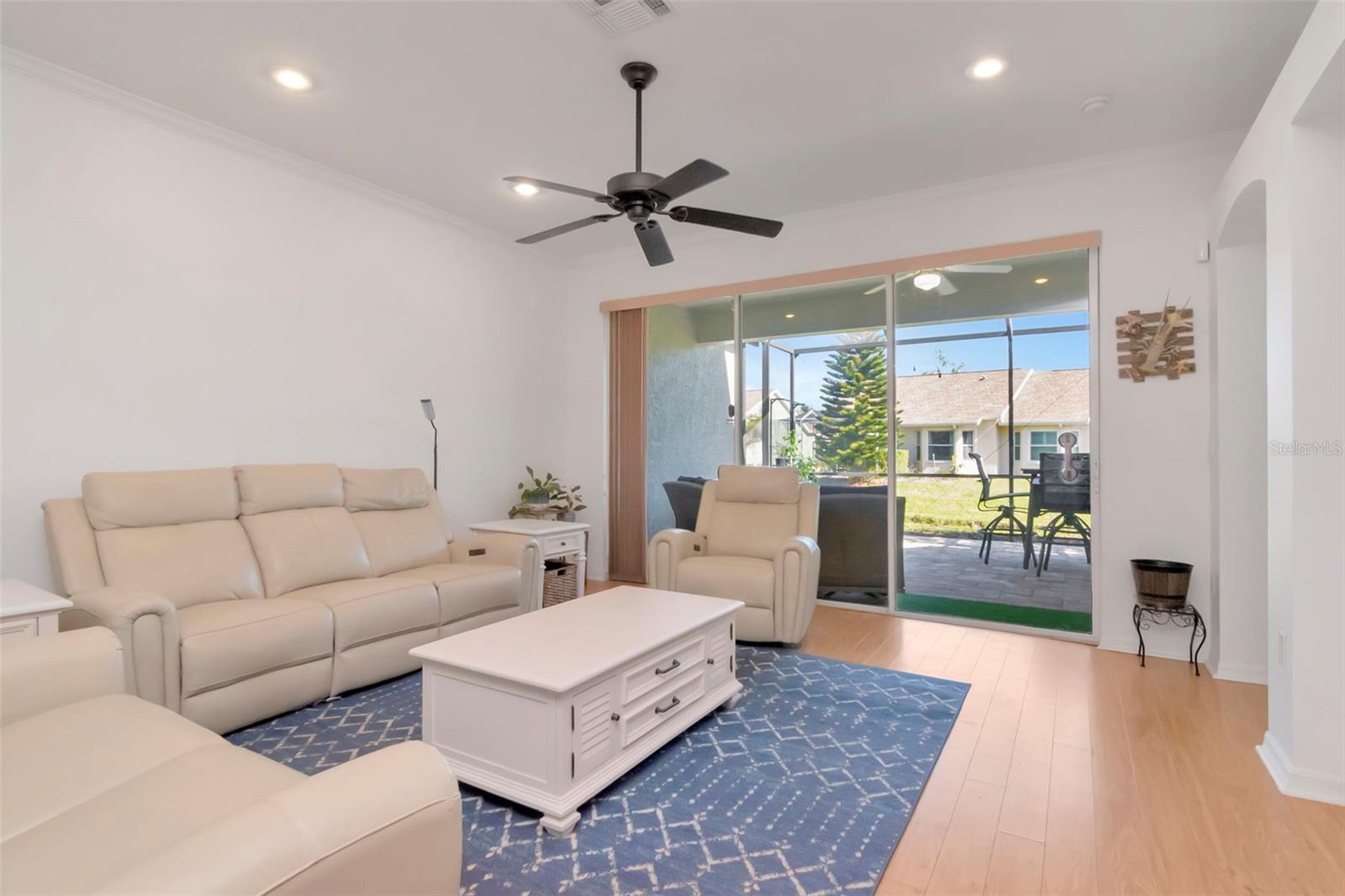 Bright living room opening to a beautiful lanai
