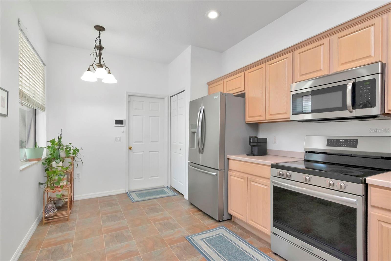 Bright kitchen with flexible space for a breakfast nook