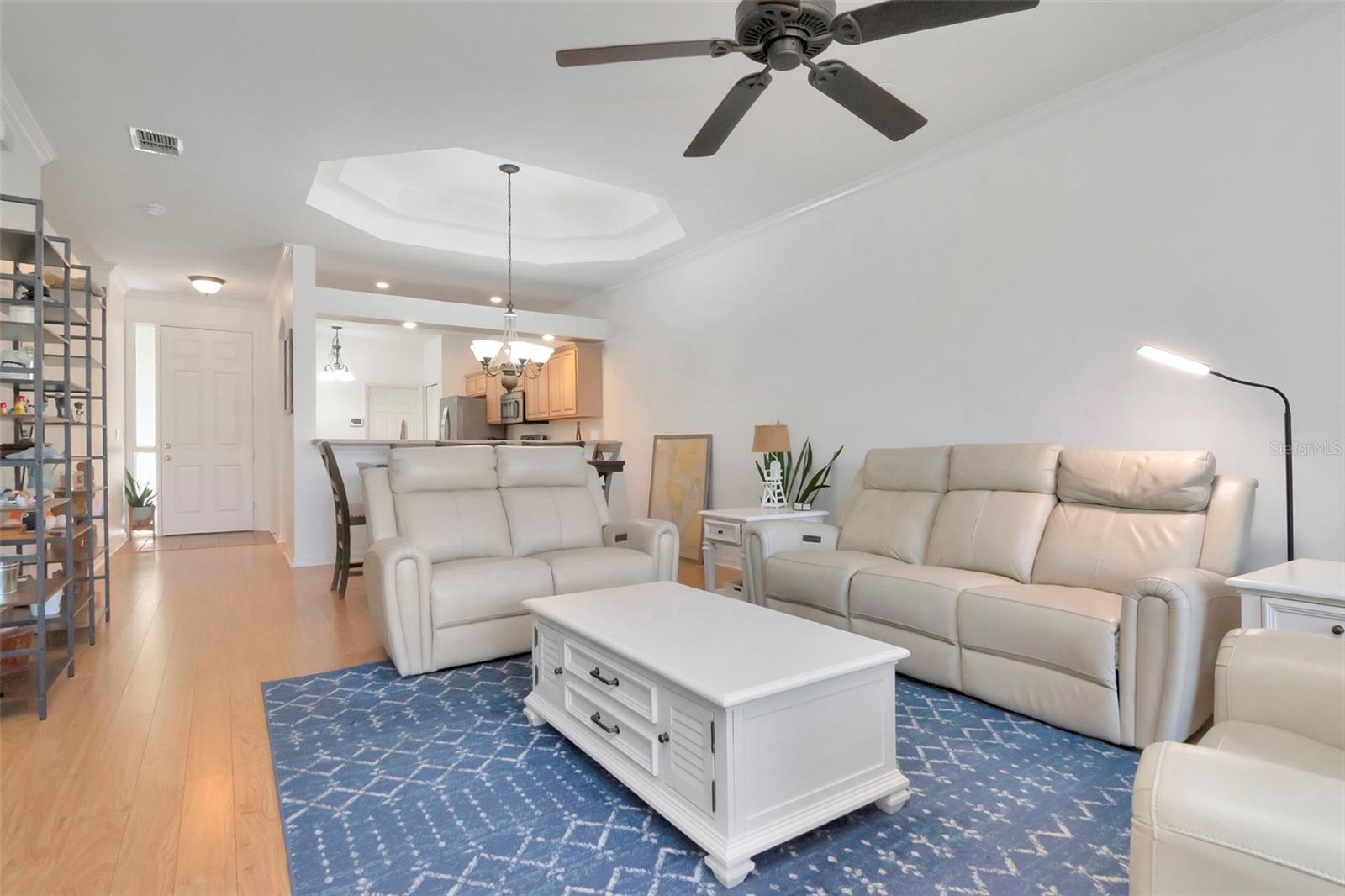 Bright, spacious living area filled with natural light