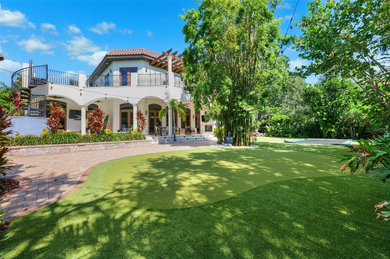 putting green with lit holes