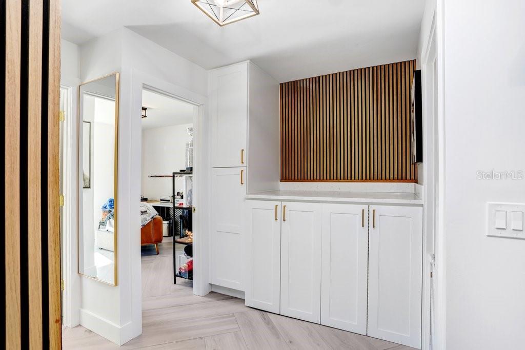 Laundry Cabinet in between 1st and 2nd Guest Rooms