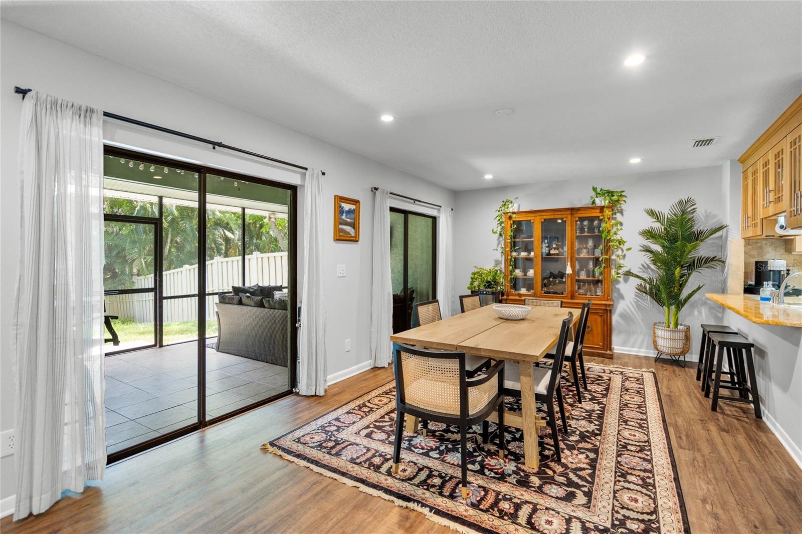 Large Dining Space to accomodate holidays, workspace and festive gatherings.  Nice view to grassy yardspace