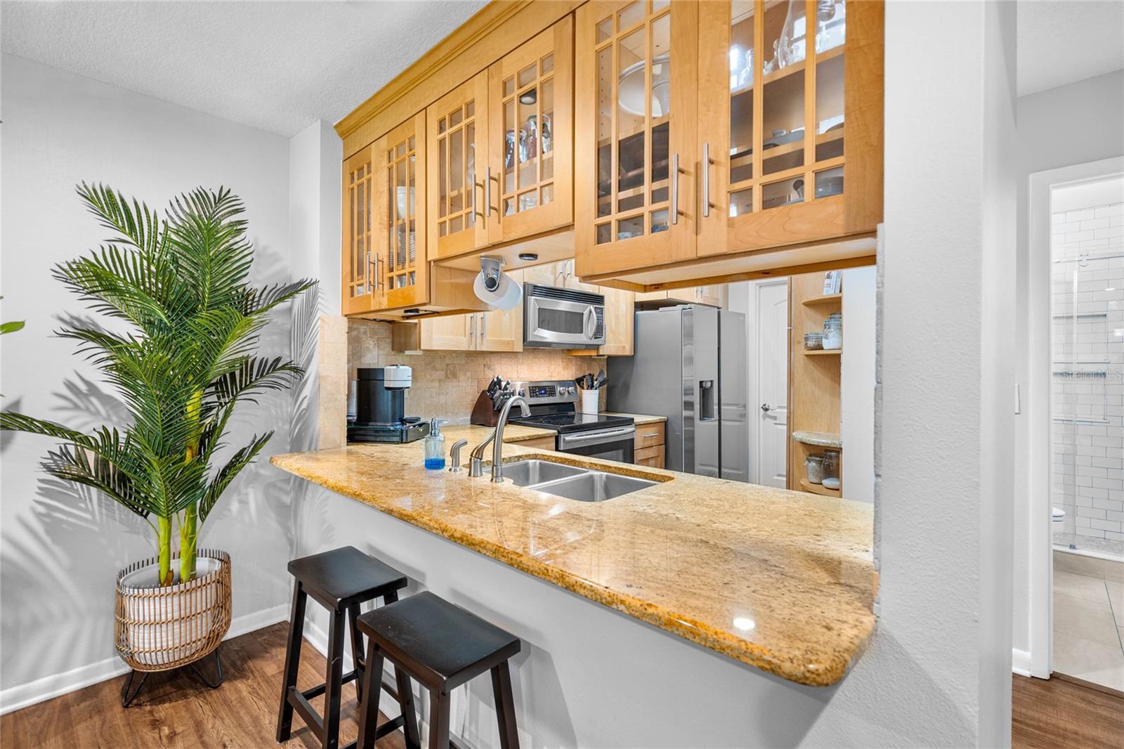 Entertain friends while in the kitchen.  Great setup in the dining entertaining space