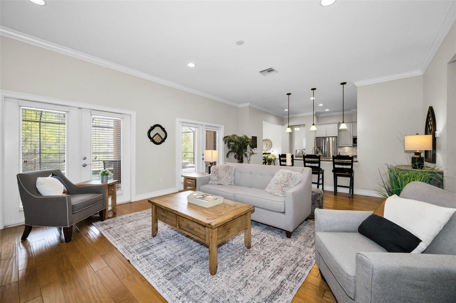 FAMILY ROOM LOOKING BACK AT THR KITCHEN