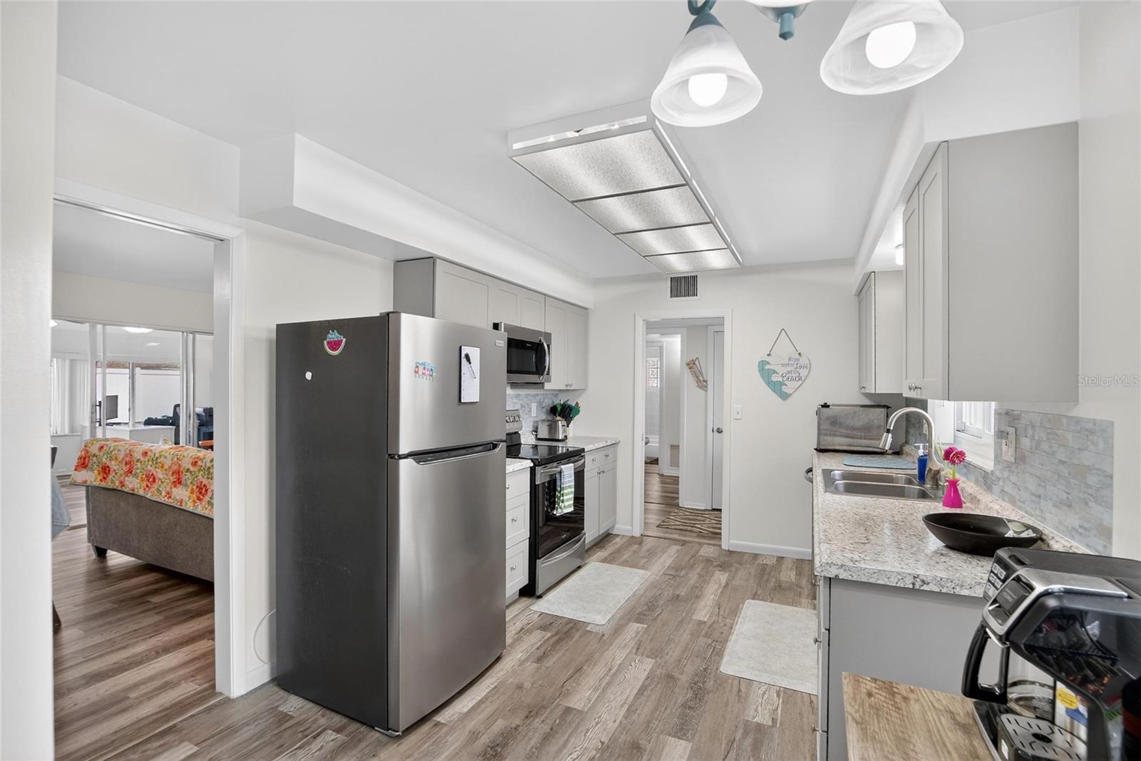 Kitchen is very good size with a closet pantry and room to eat-in