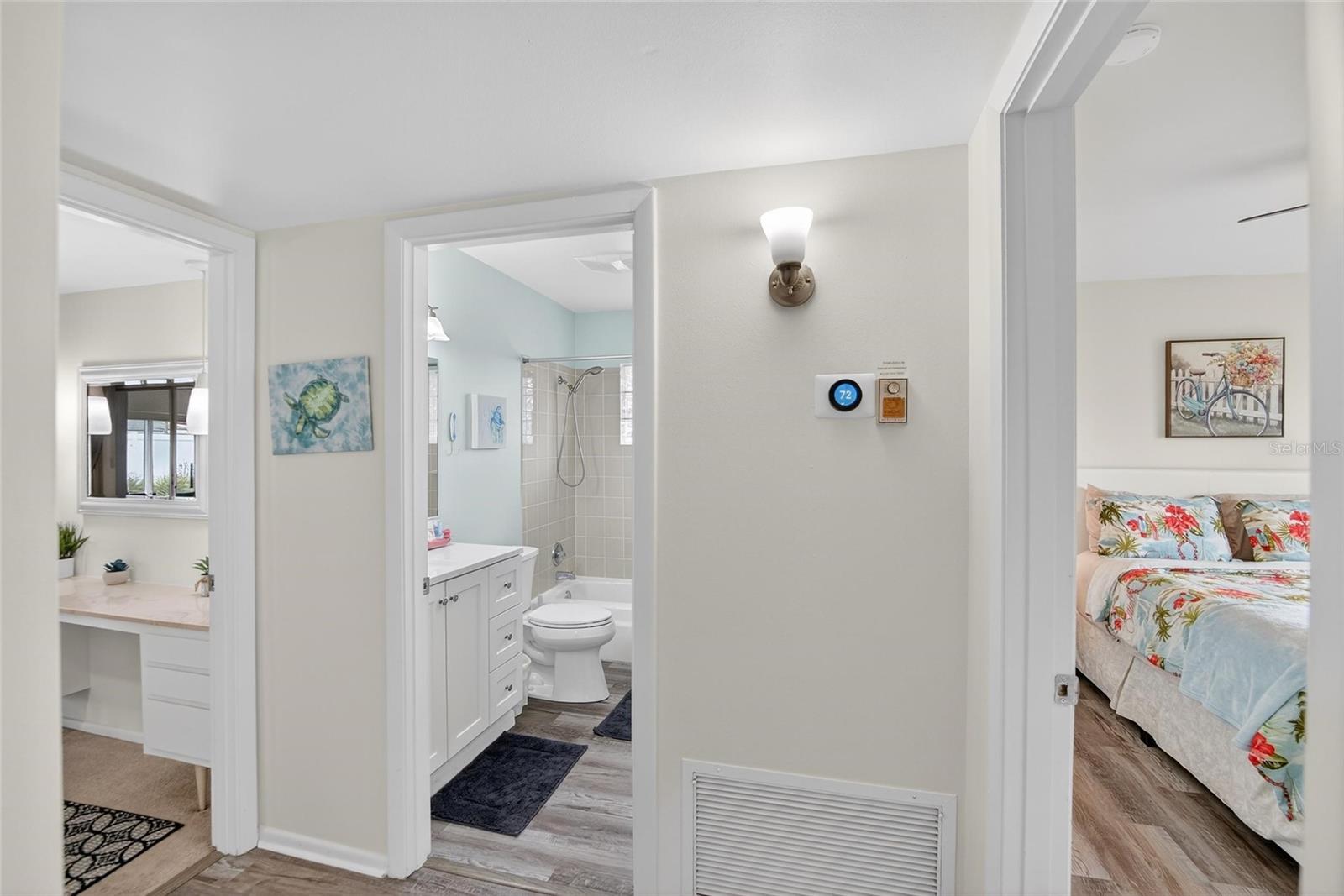 Hallway view with Primary Bedroom (left) and 2nd Bedroom (right)