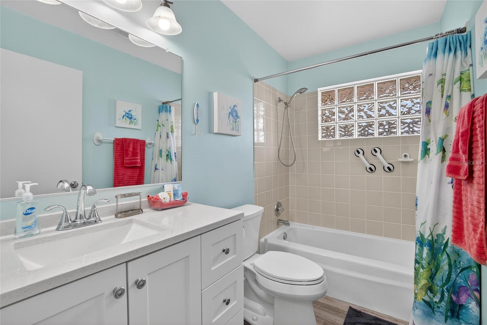 Updated guest bathroom with tub and shower