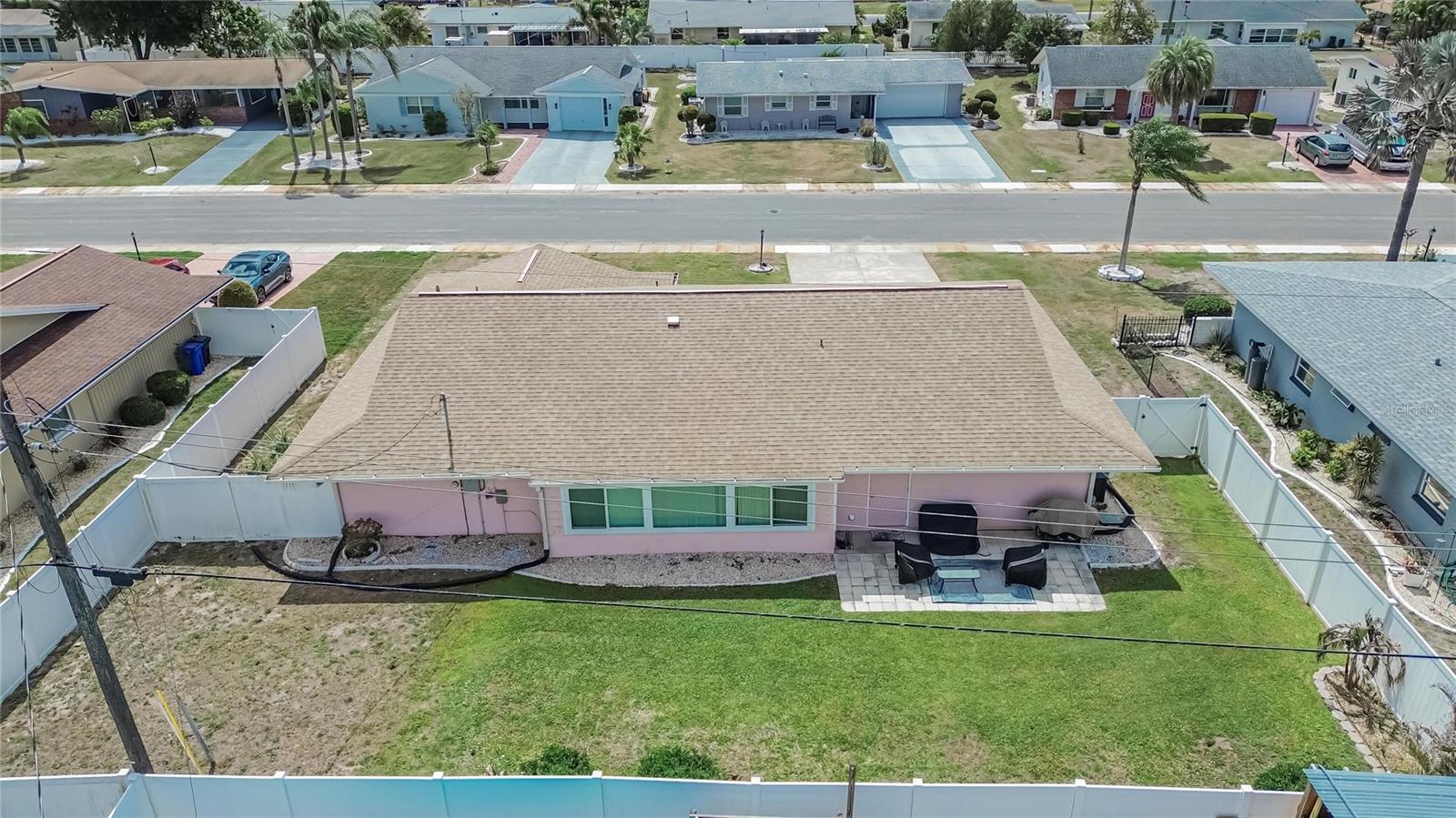 What an exquisite outdoor space! Great space for grilling or entertaining. Plenty of space for a pool, garden or outdoor activity