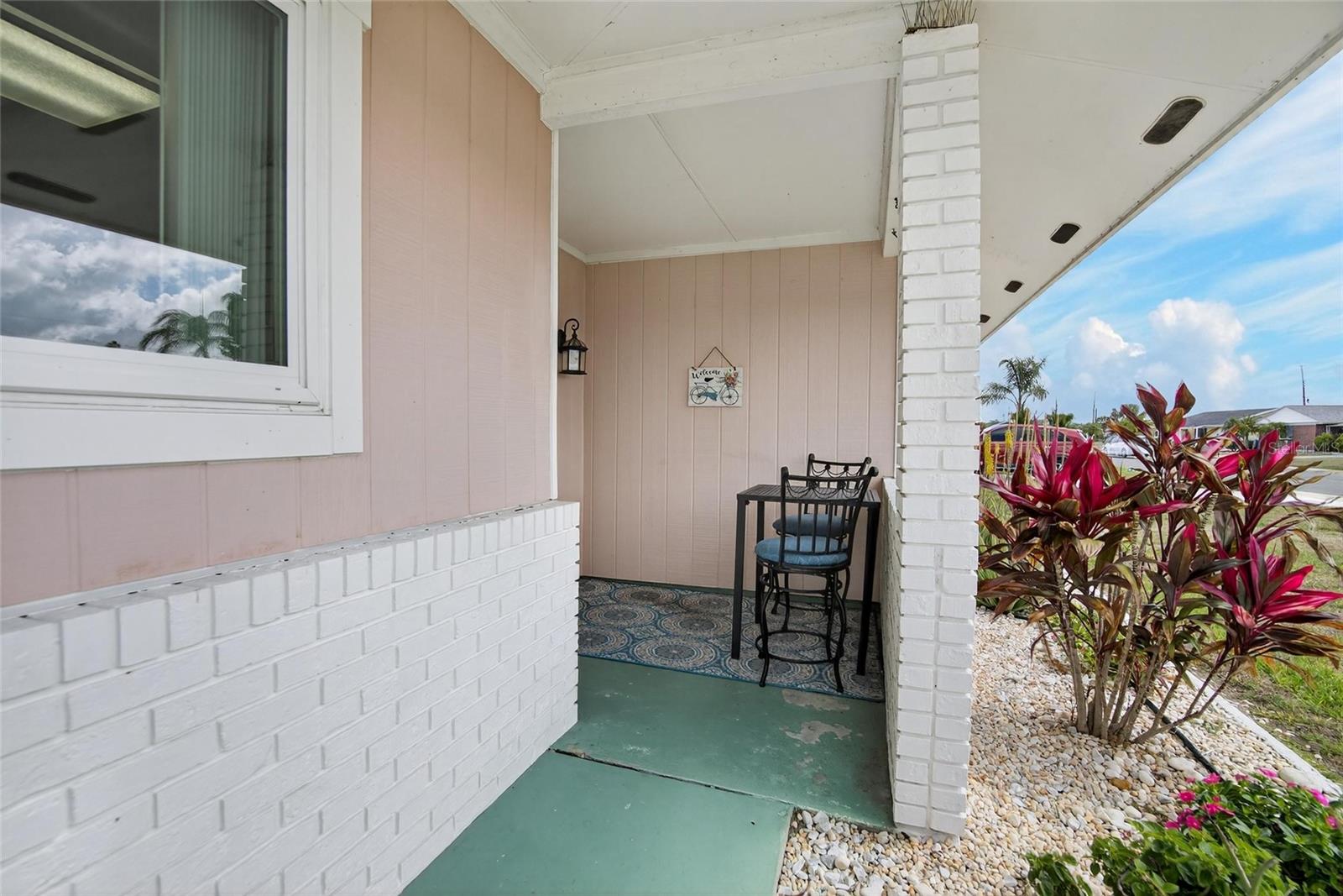 Enjoy the front porch with an early morning coffee, afternoon iced tea or a glass of wine