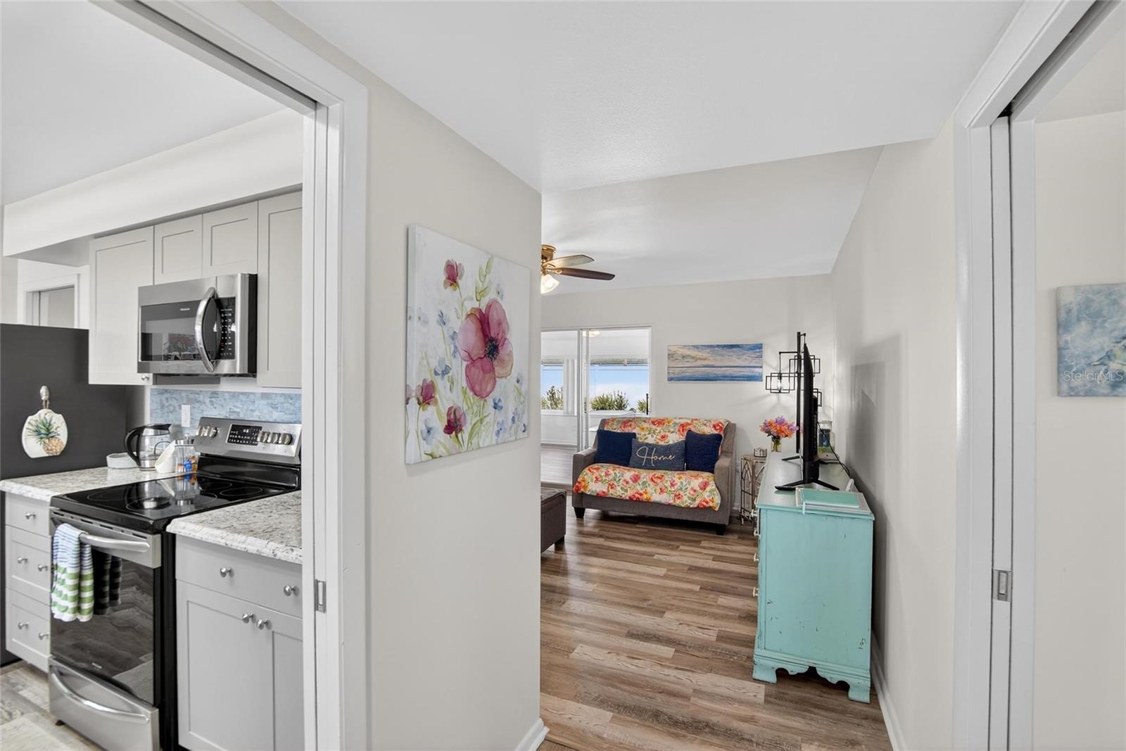 WELCOME to the freshly painted home!  Heading to the main living area