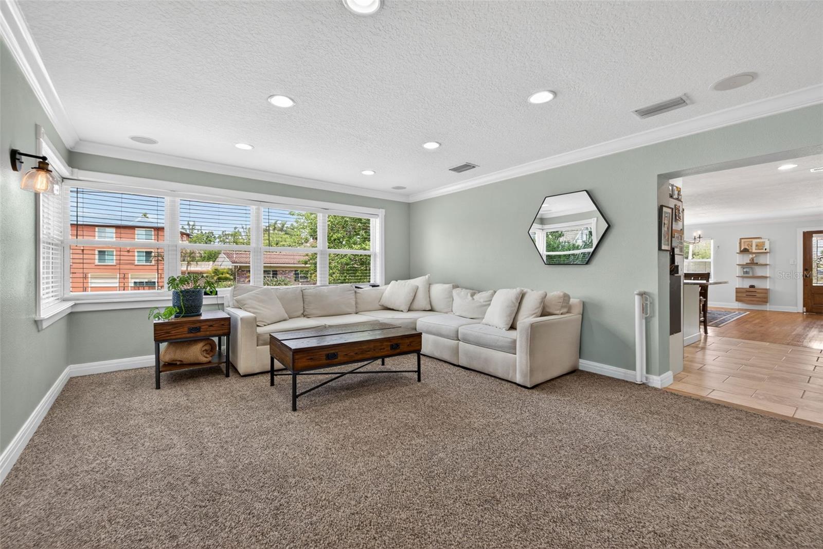 Family Room with Kitchen/Dining Room in Background