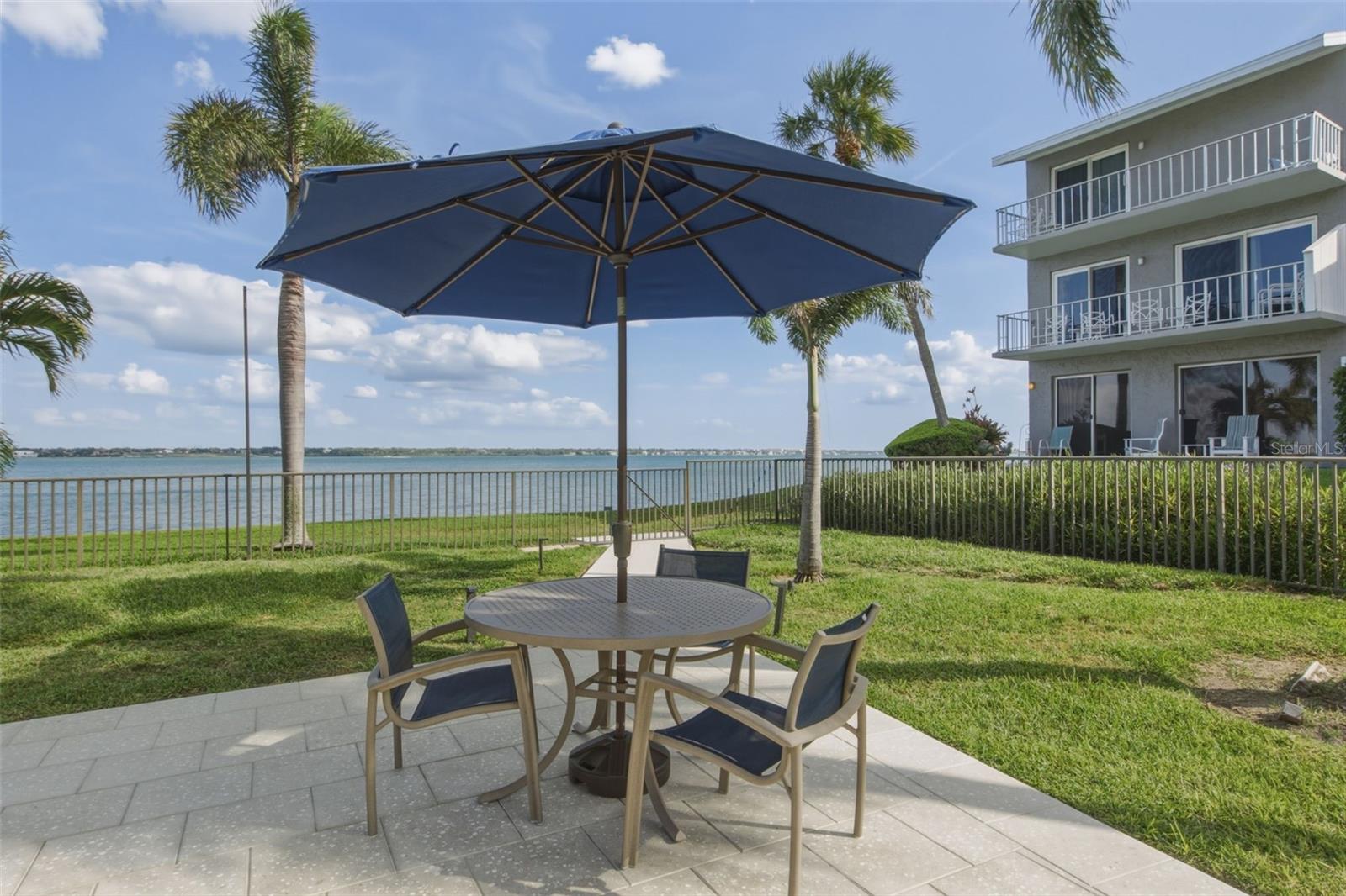 Waterfront poolside area for dining or relaxing