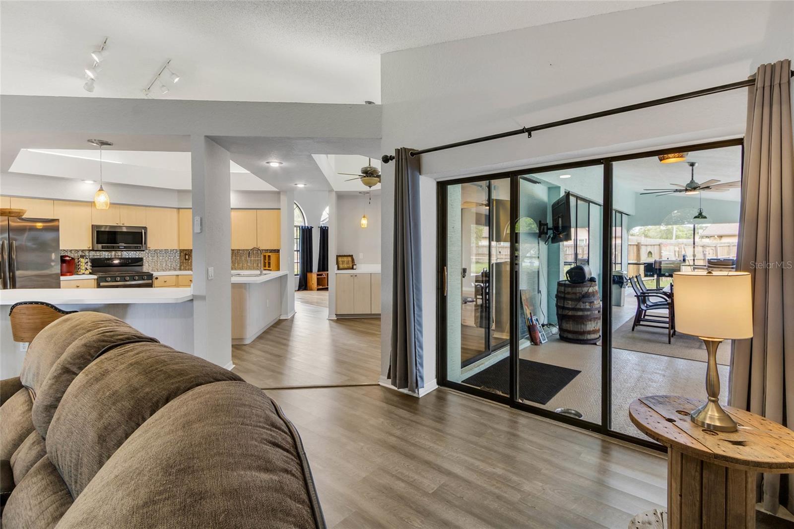 Family room with pocket slider to pool deck