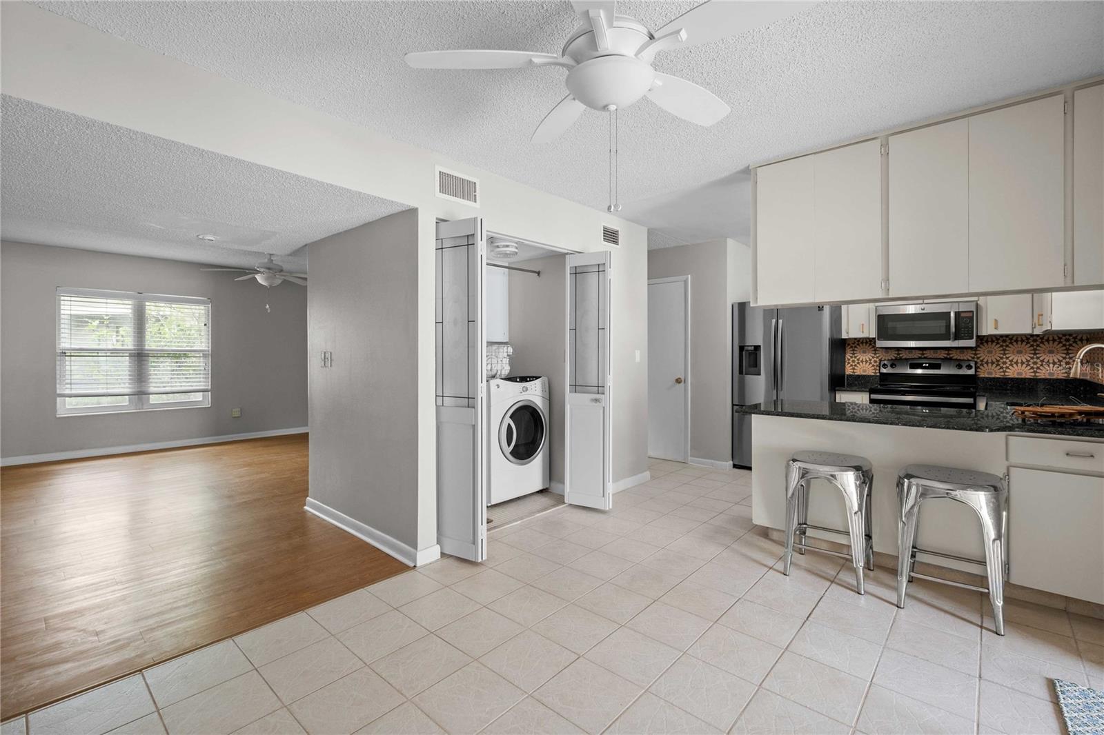 Dining Room looking into kitchen and living room
