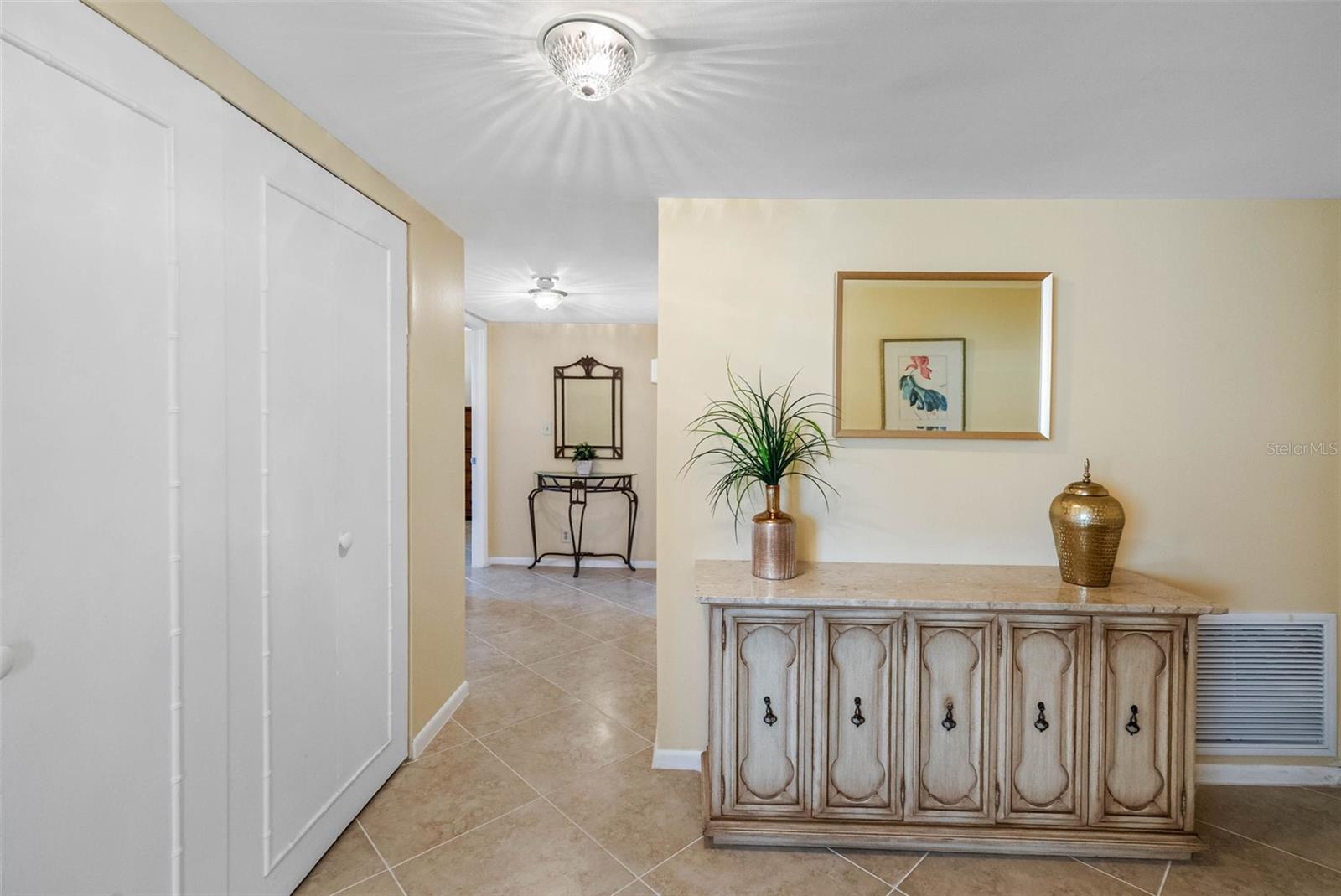 Central Foyer leads to beds & baths