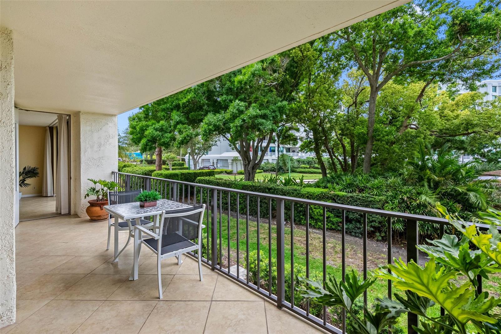 Large Balcony with Lush Greenery