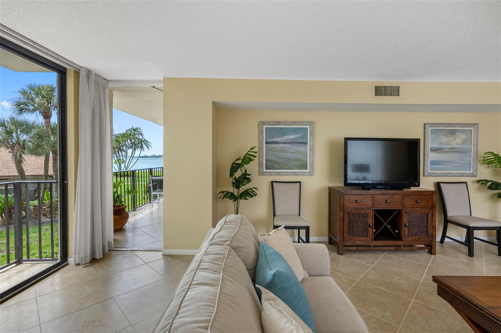 Balcony access with incredible water and garden views.