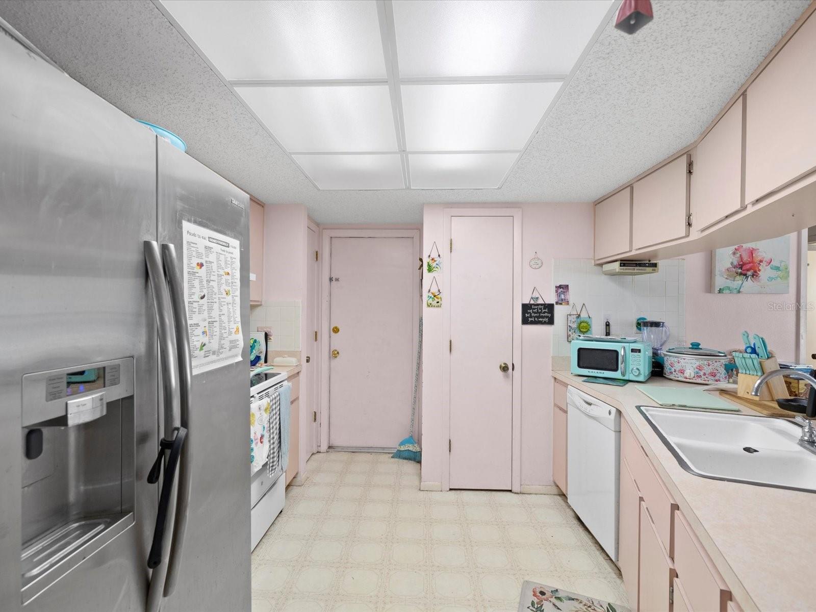 2 small closet pantries and door to garage