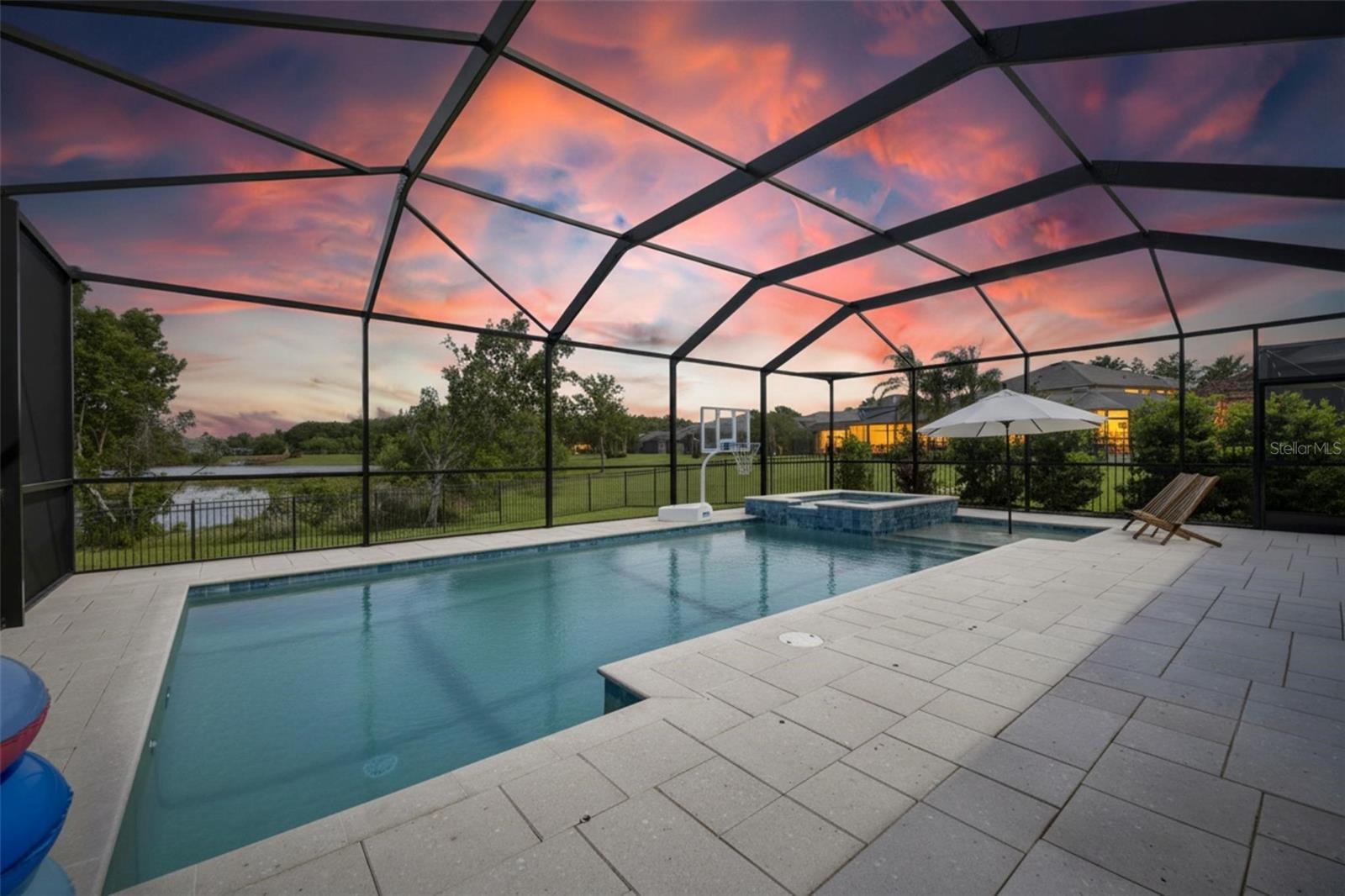 Enjoy the pool and spa at dusk