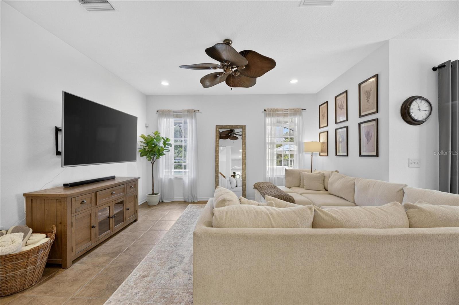 Living room overlooks the pool and lake