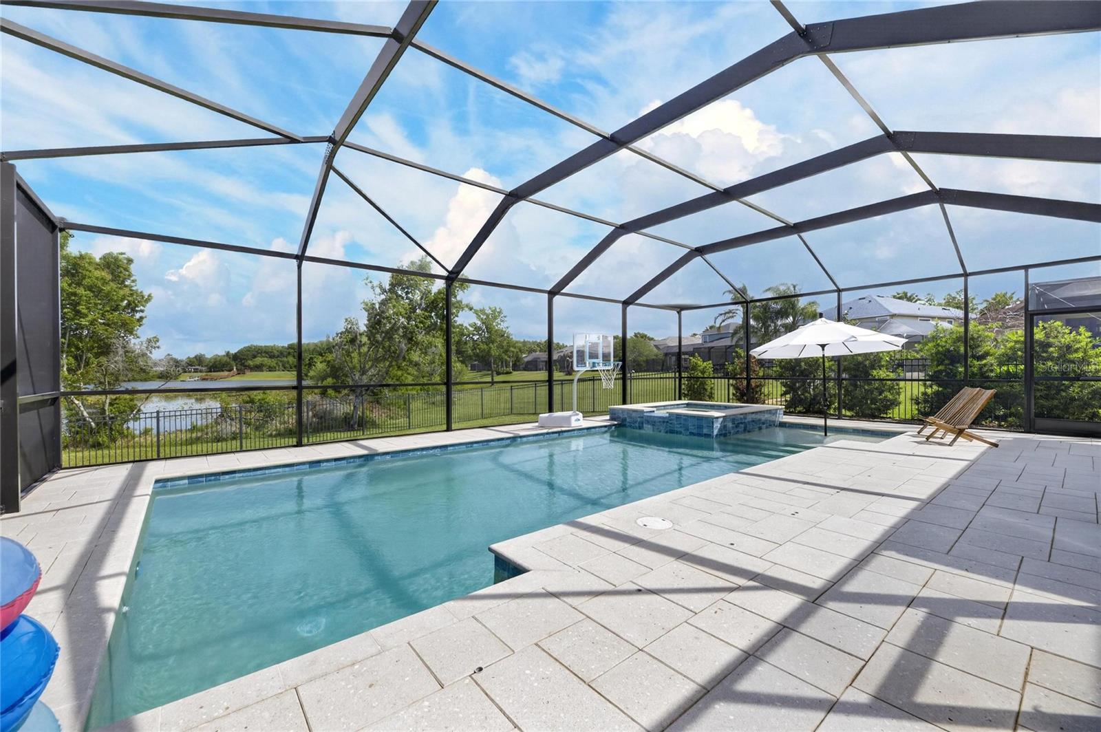 Views of the 16 acre spring fed lake from the screened pool deck