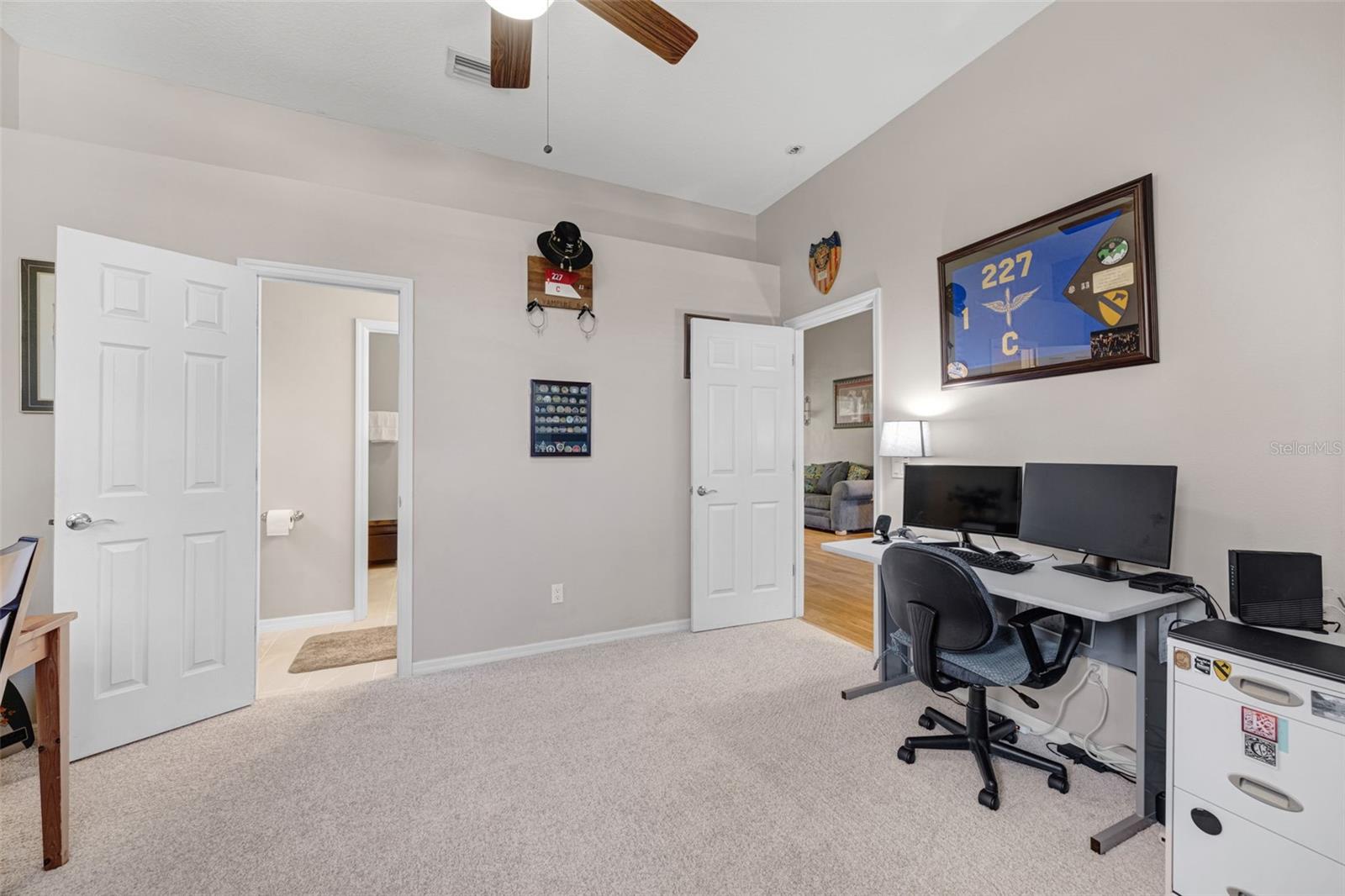 The Office/Den is connected to the Primary Bedroom and has another door to the main living area.