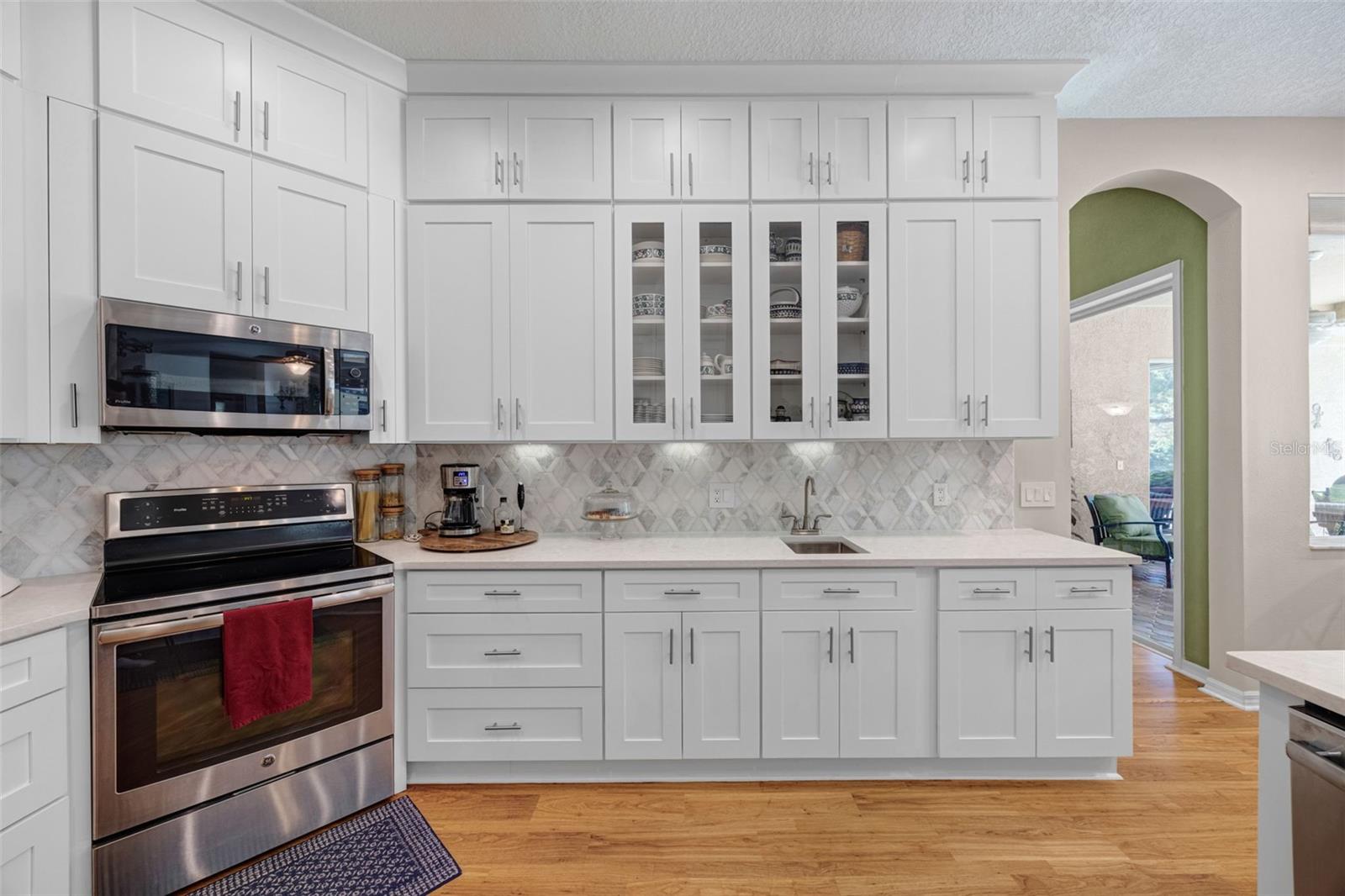 Check out the beautiful glassed-in display cabinets and under cabinet lighting.