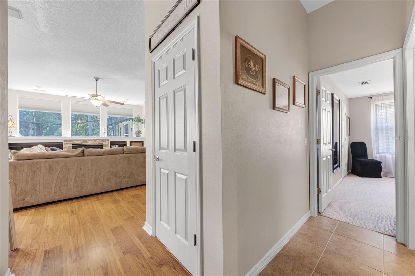 The in-law suite is located off the Great Room, next to the huge walk-in closet under the stairs.