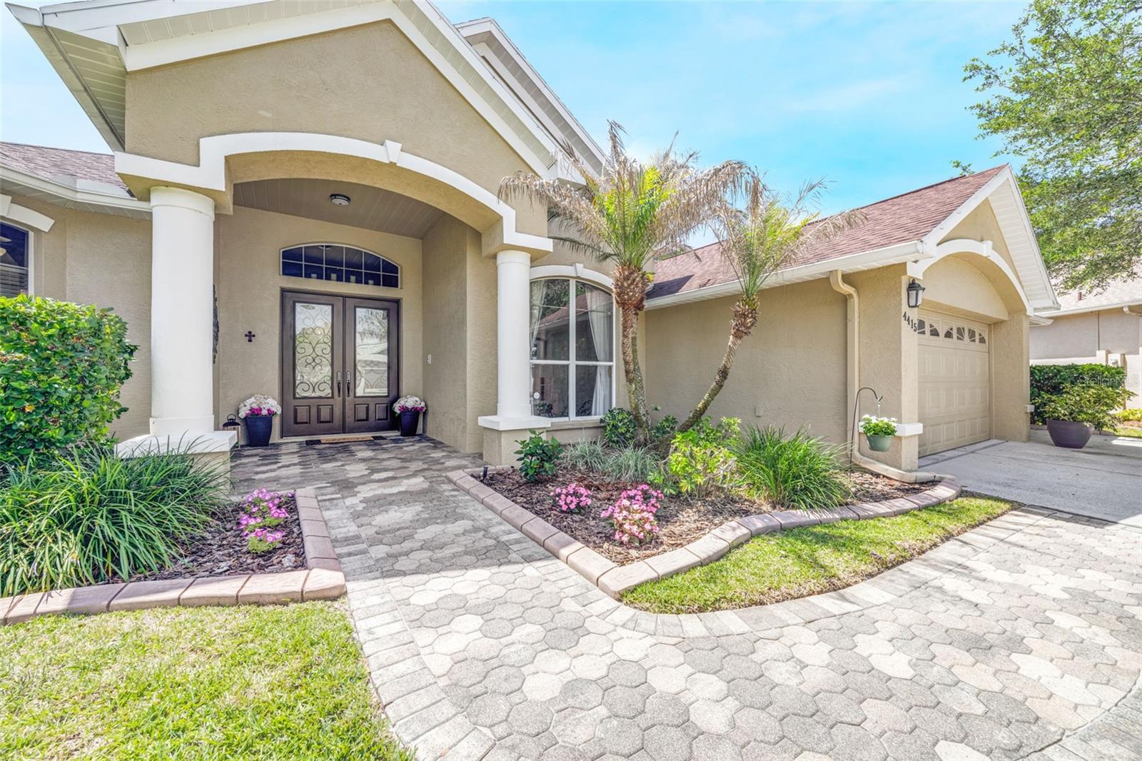 This home has beautiful, easy to maintain curb appeal.
