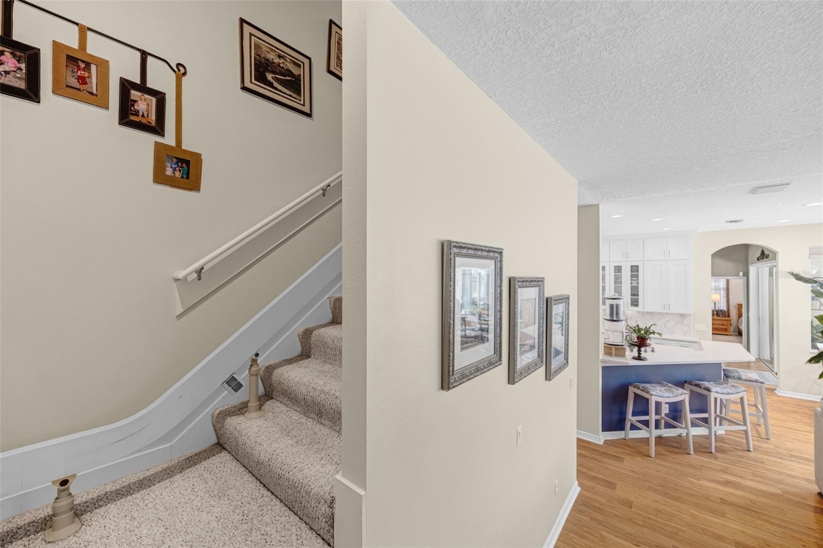 The stairs are off the Great Room.