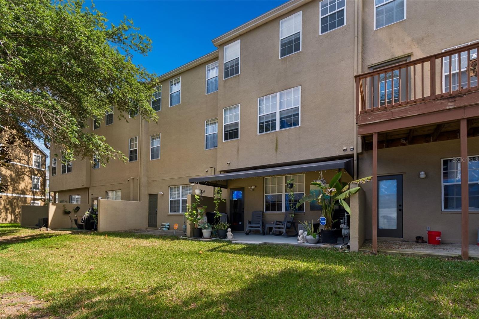 Covered Outdoor Patio and Green Space