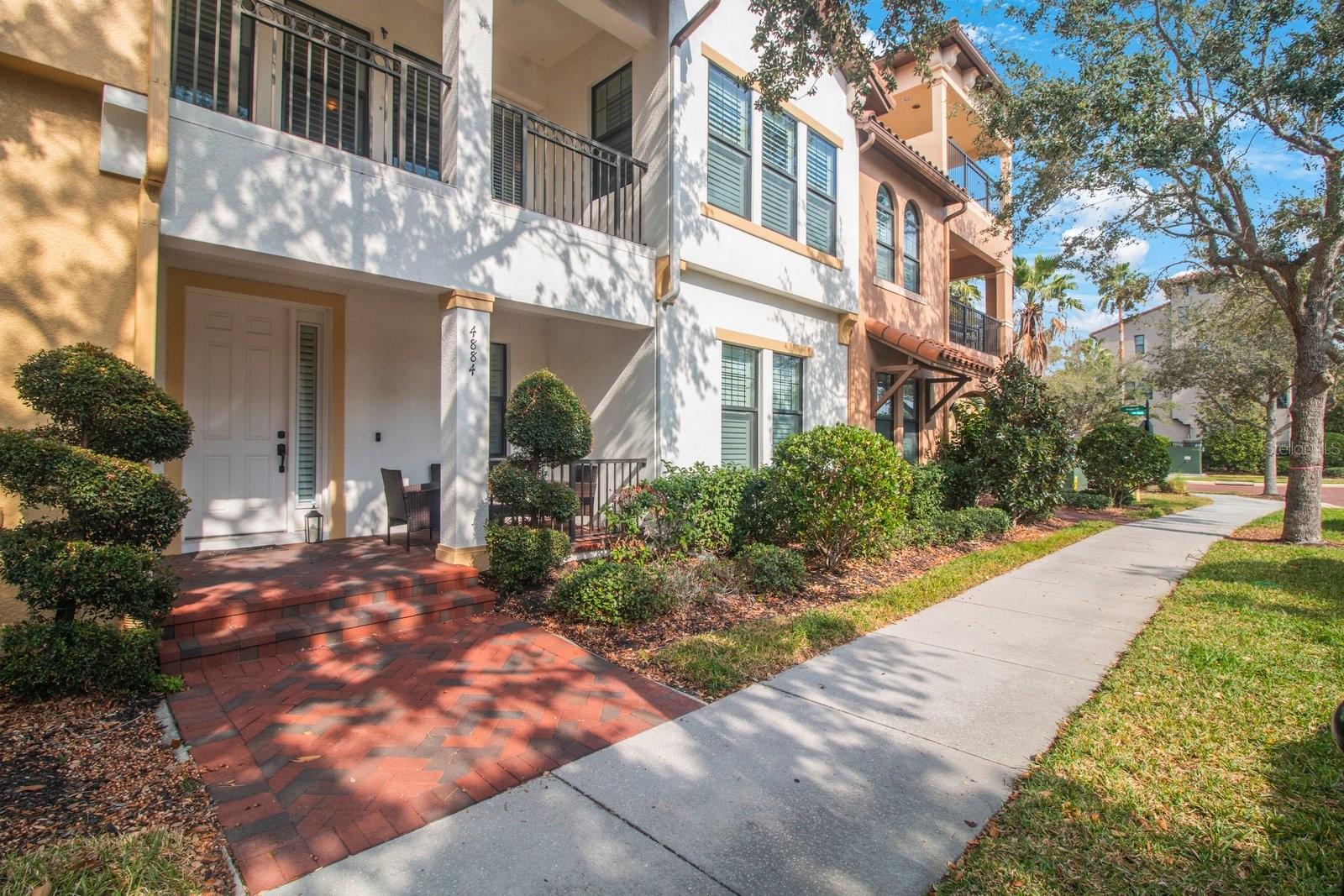 Stunning community with tree lined streets and resident friendly sidewalks