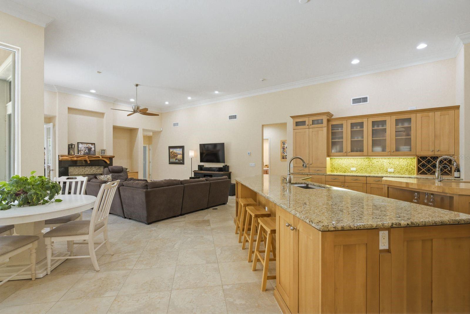 Open concept family room, Kitchen and breakfast nook · 976 Cypress Cove Way Tarpon Springs FL 34688