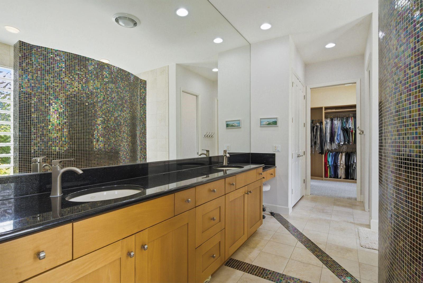 Spa-worthy primary bath, dual sinks & custom walk-in shower · 976 Cypress Cove Way Tarpon Springs FL 34688