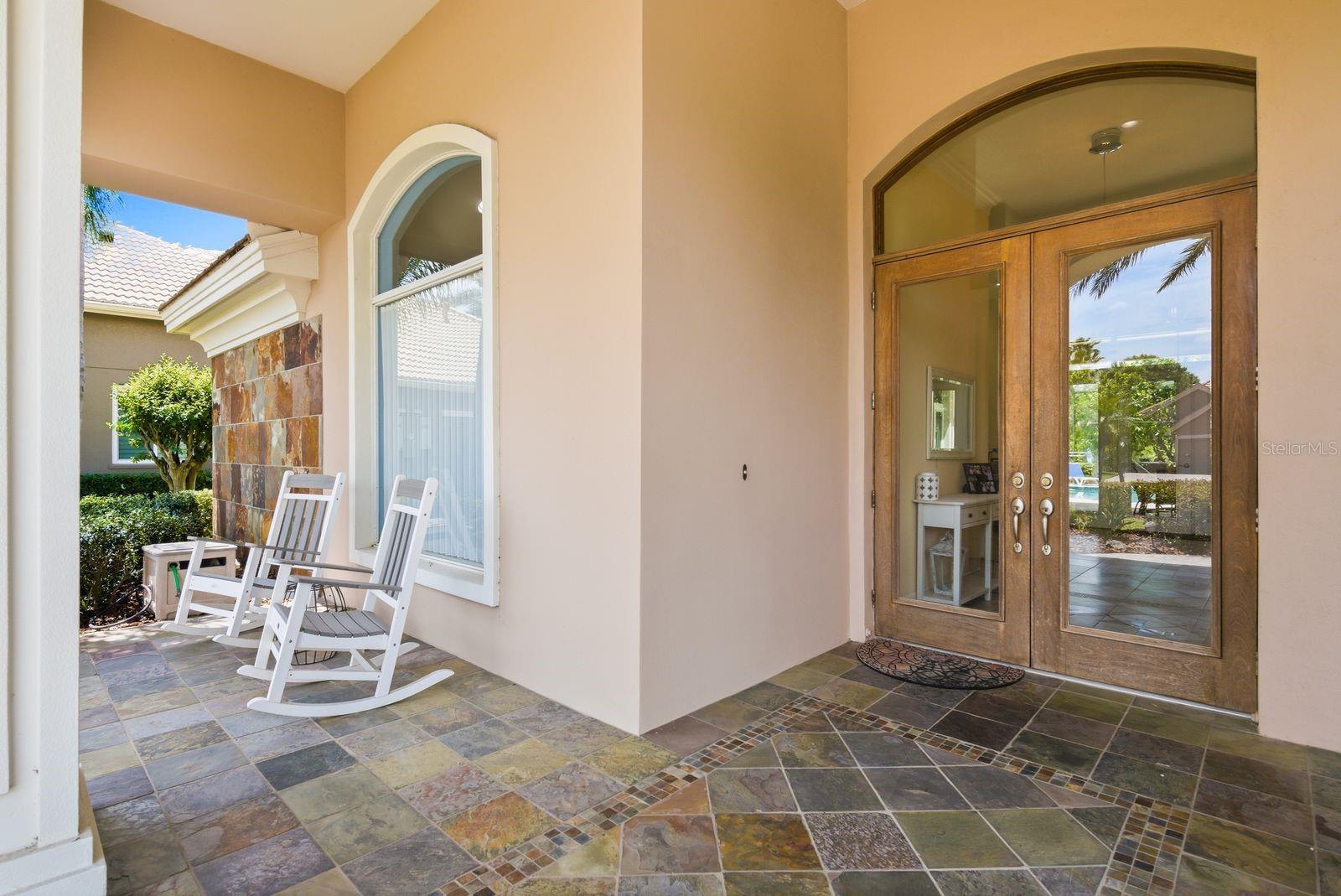 Elegant double glass entry doors, 28-home gated enclave · 976 Cypress Cove Way Tarpon Springs FL 34688