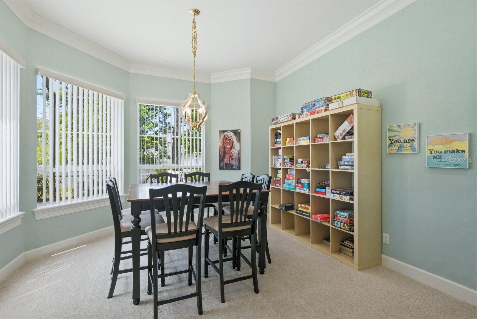 Conservatory w/ gas fireplace, elegant entertaining space · 976 Cypress Cove Way Tarpon Springs FL 34688