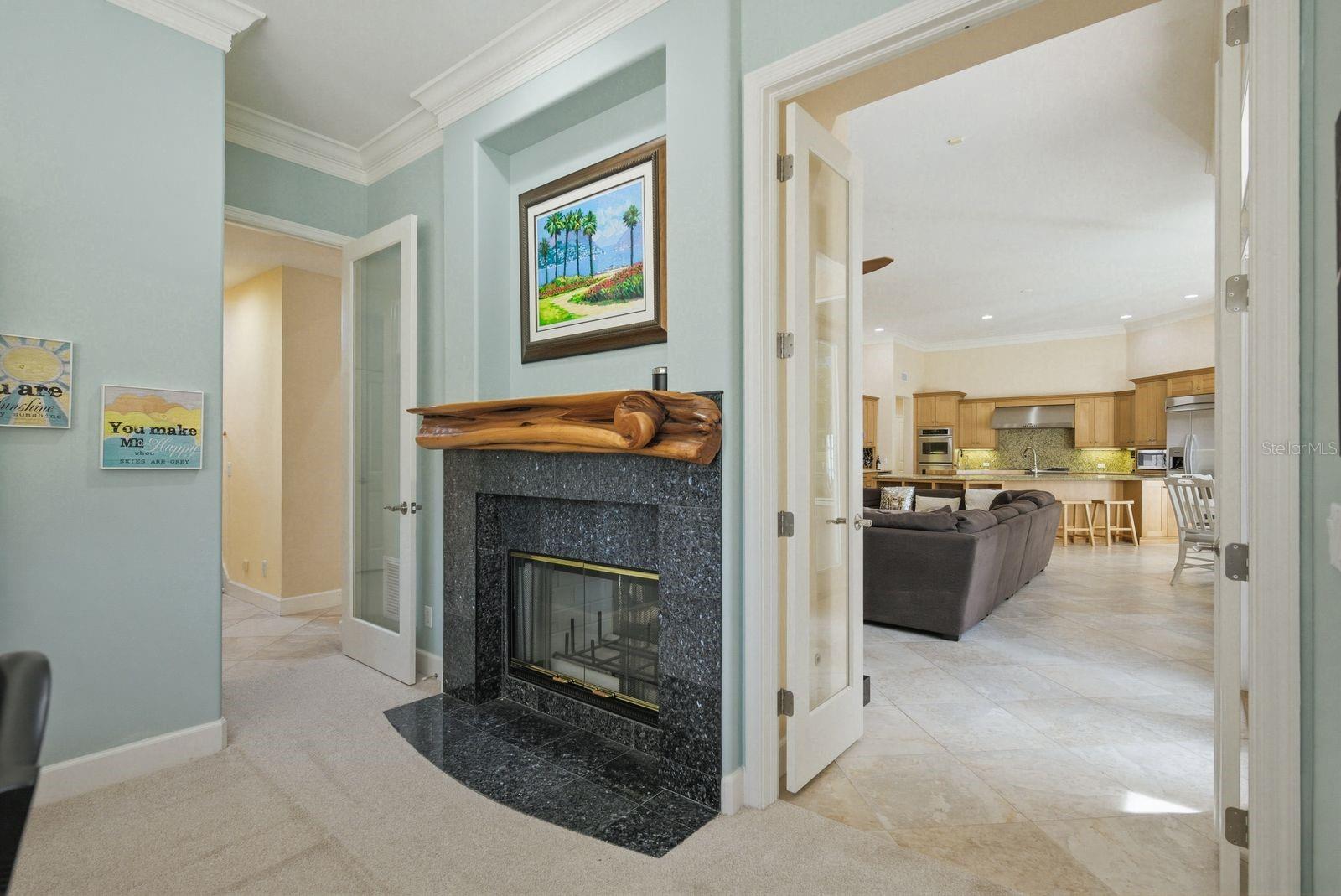 Conservatory w/ gas fireplace, elegant entertaining space · 976 Cypress Cove Way Tarpon Springs FL 34688